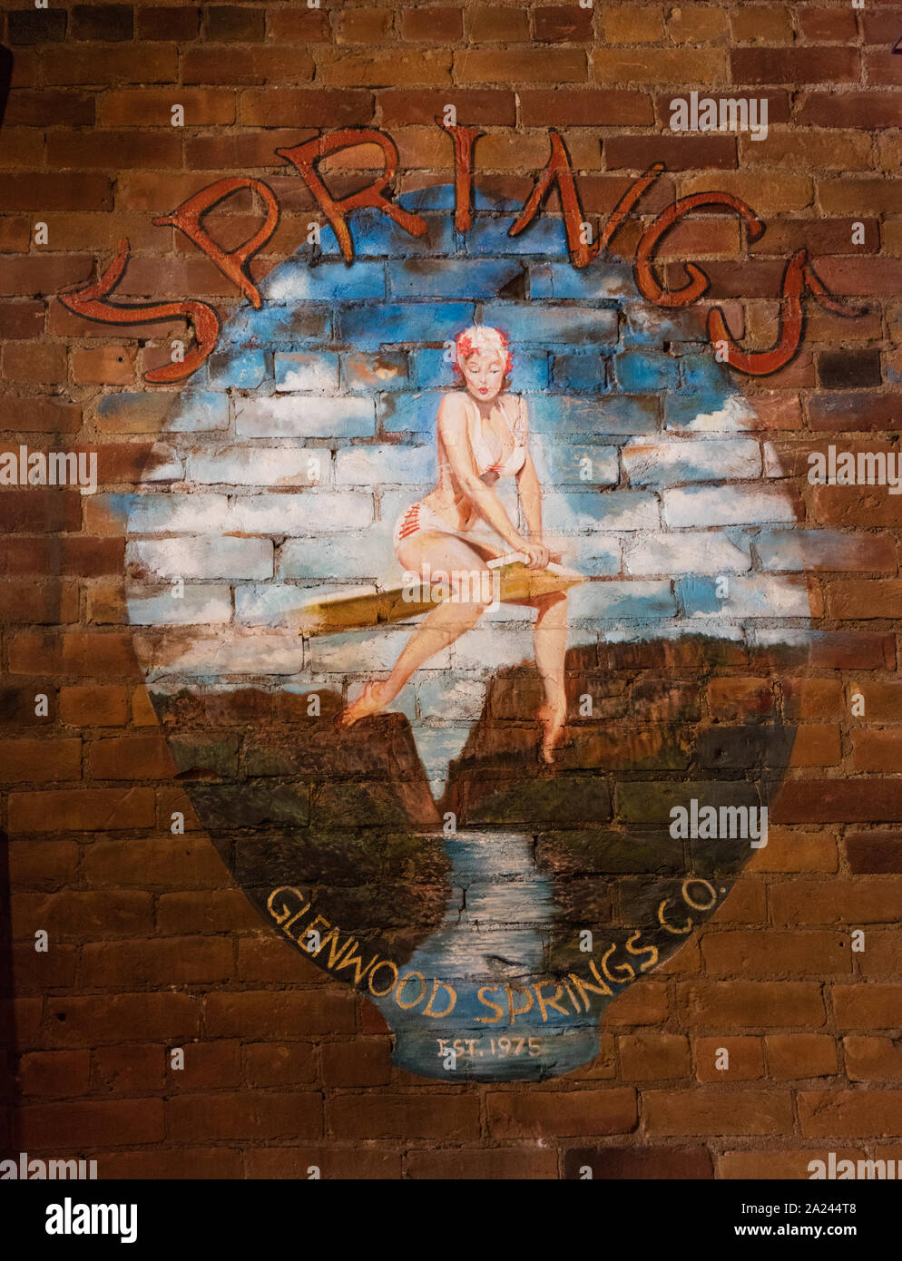 Painted sign inside the Springs Downtown Bar and Grill, which turned a