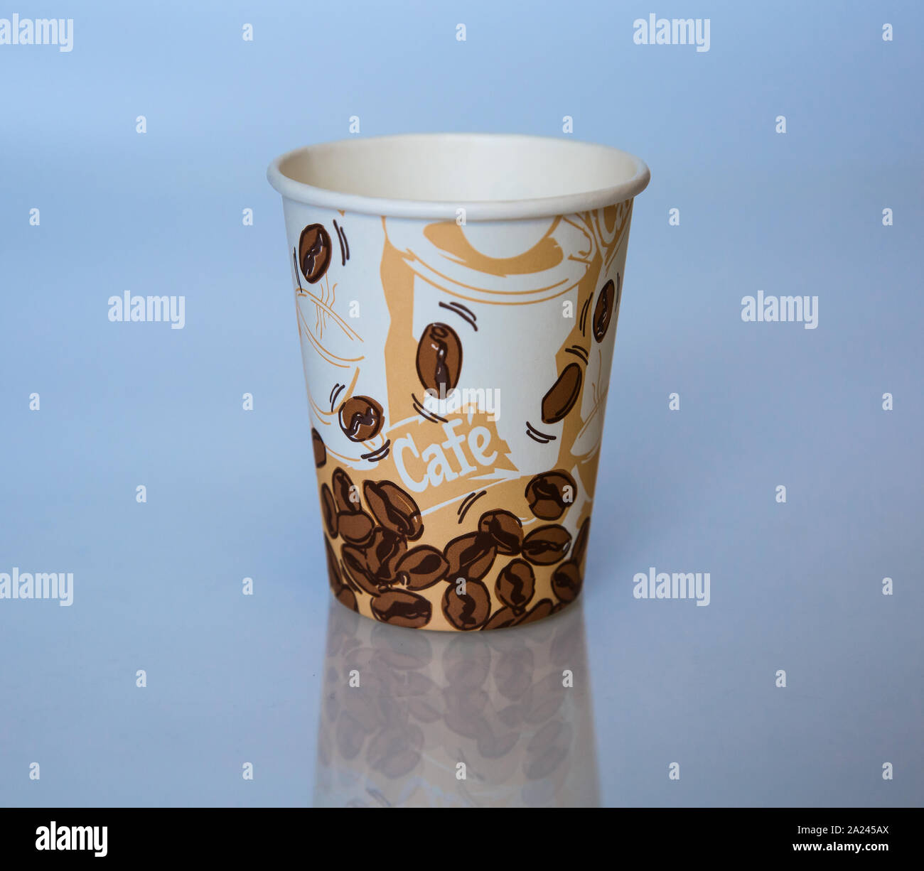 Beautiful cardboard disposable cup for coffee and other. Stock Photo