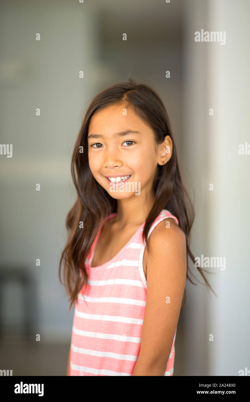 Portrait of a cute little girl smiling. Stock Photo