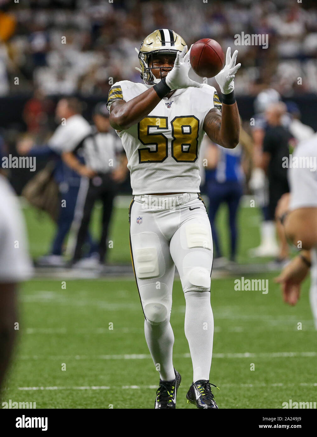 New Orleans, LA, USA. 29th Sep, 2019. New Orleans Saints linebacker Justin Anderson (58) catches a pass in pre game warm ups before their game against the Dallas Cowboys at the Mercedes Benz Superdome in New Orleans, LA. Jonathan Mailhes/CSM/Alamy Live News Stock Photo
