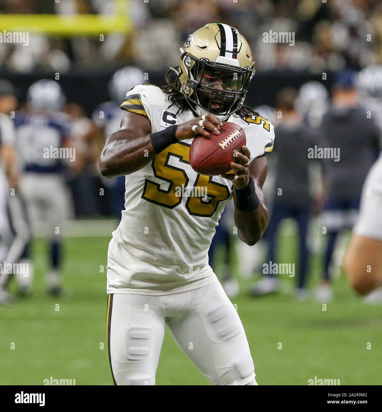 New Orleans, LA, USA. 29th Sep, 2019. New Orleans Saints linebacker Demario Davis (56) catches a pass in pre game warm ups before their game against the Dallas Cowboys at the Mercedes Benz Superdome in New Orleans, LA. Jonathan Mailhes/CSM/Alamy Live News Stock Photo