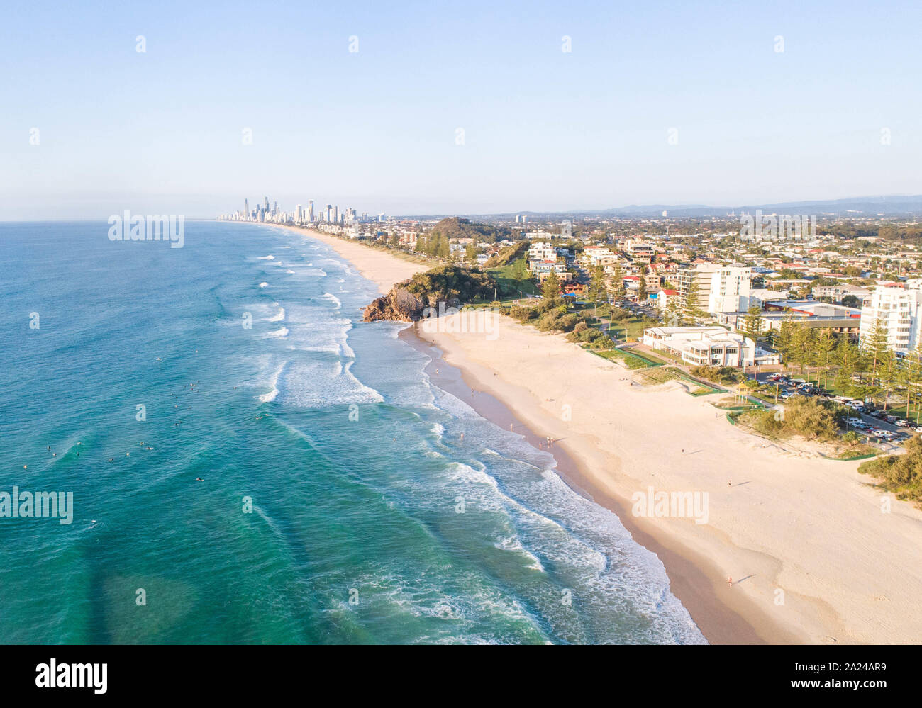 Burleigh heads on the gold coast with nice afternoon sun, gentle waves and beach lifestyle. Aerial view of a favourite holiday destination in Queensl Stock Photo