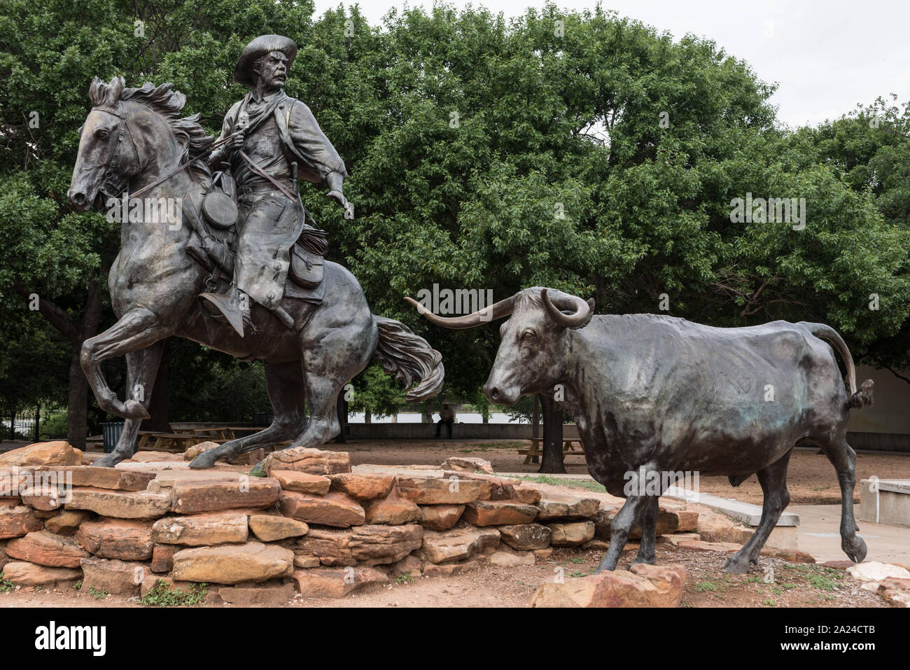 Part of Robert Summers's sculpture, The Waco Chisholm Trail Heritage, near the historic Waco Suspension Bridge, now a pedestrian and bicyclists' bridge across the Brazos River in Waco, Texas Stock Photo