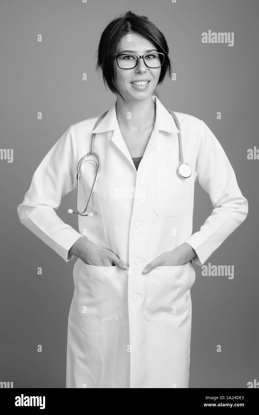 Portrait of young woman doctor shot in black and white Stock Photo - Alamy