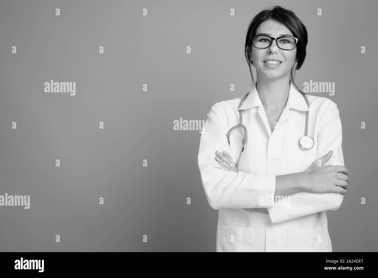 Portrait of young woman doctor shot in black and white Stock Photo - Alamy