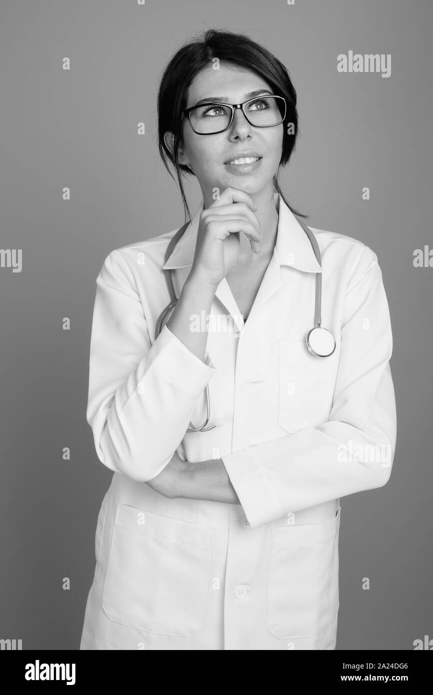 Portrait of young woman doctor shot in black and white Stock Photo - Alamy