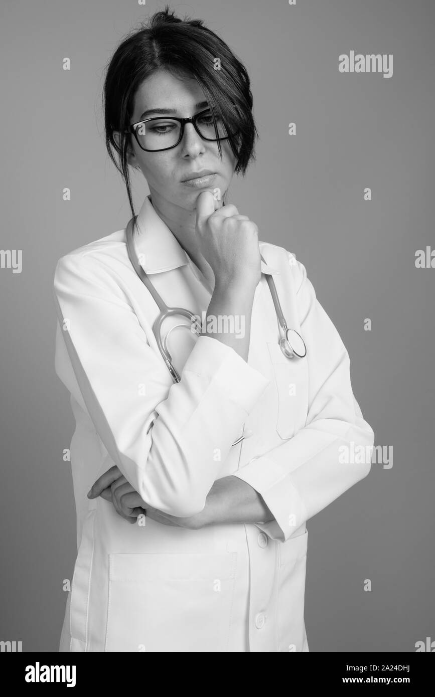 Portrait of young woman doctor shot in black and white Stock Photo - Alamy
