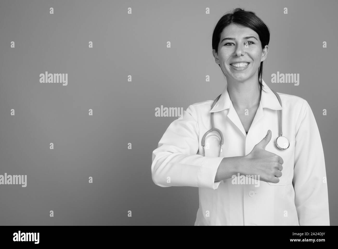 Portrait of young woman doctor shot in black and white Stock Photo - Alamy