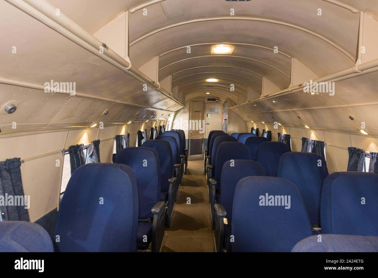 Passenger cabin of the Flagship Knoxville, a fully restored DC-3 aircraft at the American Airlines C.R. Smith Museum on the campus of the American Airlines Flight Academy, at the southern end of DFW International Airport near the world headquarters of American Airlines Stock Photo