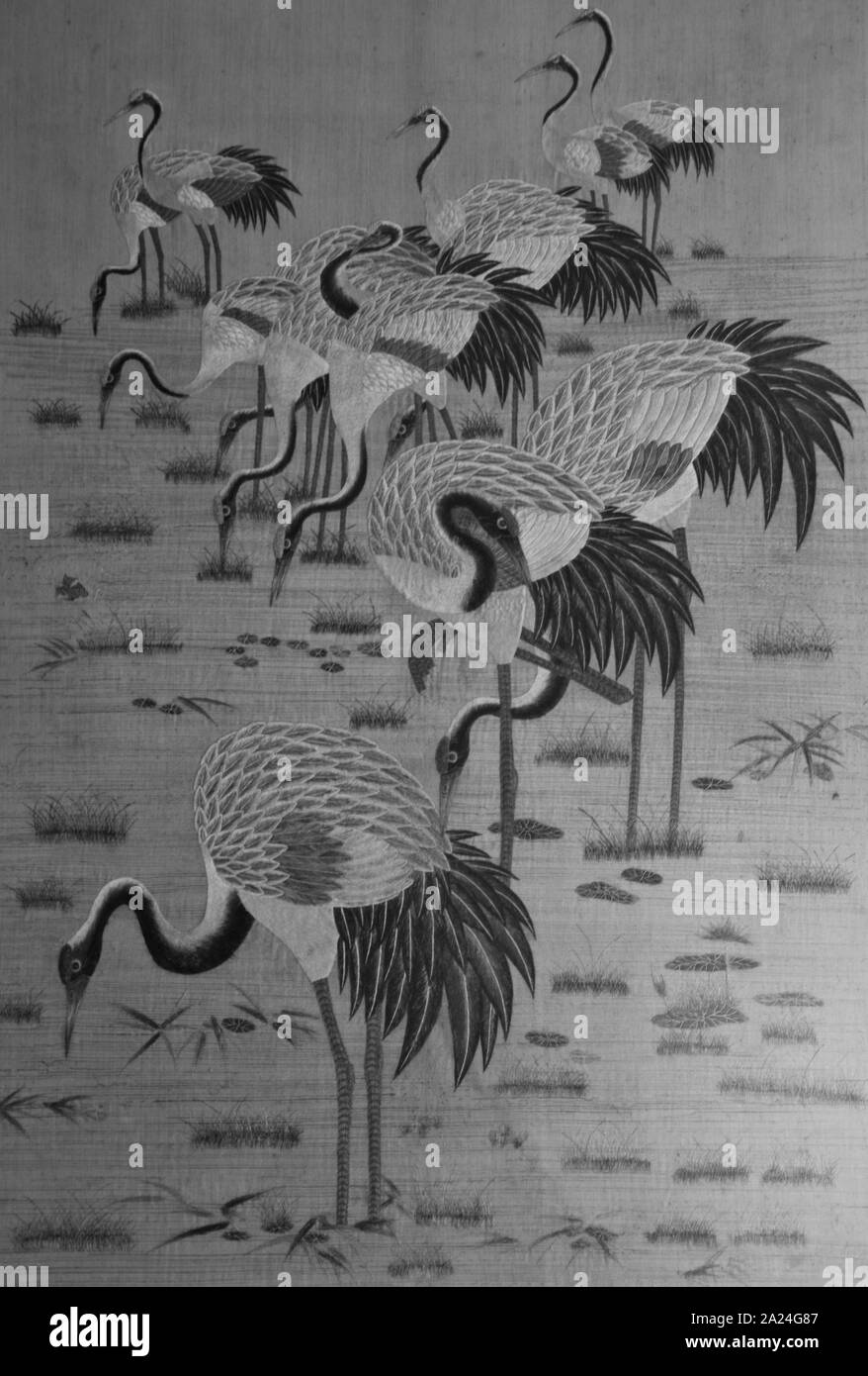 painted stork art work hanging on the wall Stock Photo