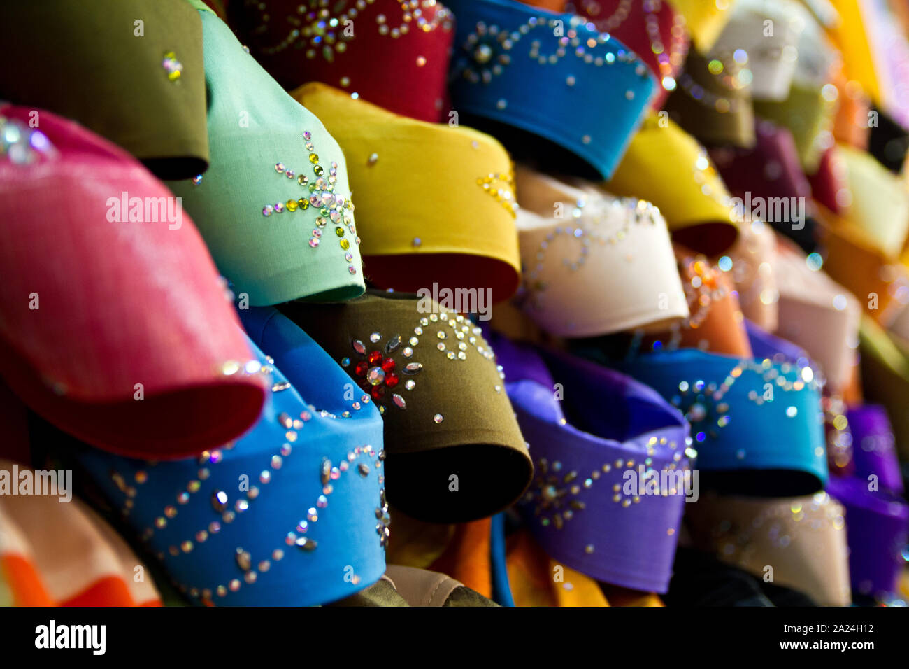 Colorful head cover for muslim women displayed at a shop in Terengganu Malaysia in portrait orientation Stock Photo