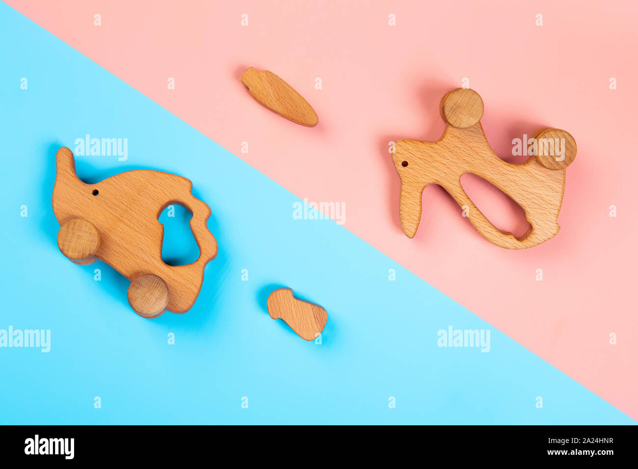 Minimalistic flat lay with a wooden toys rabbit with carrot, hedgehog ...