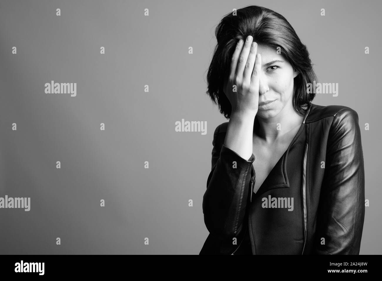 Hand covering eyes black and white hi-res stock photography and images ...