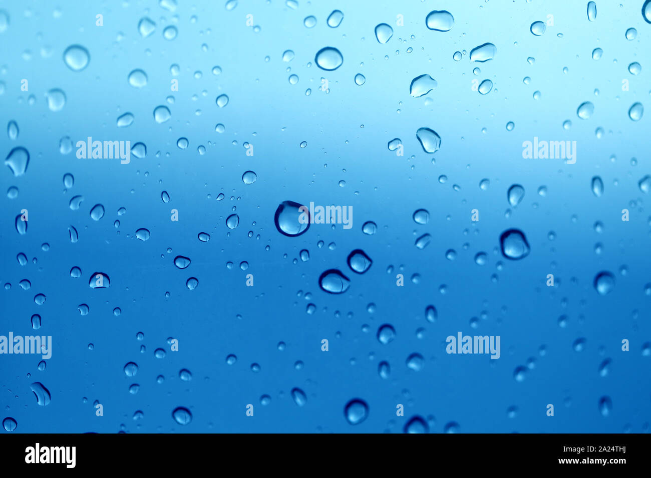 Photo background macro transparent blue drops of water on glass Stock ...