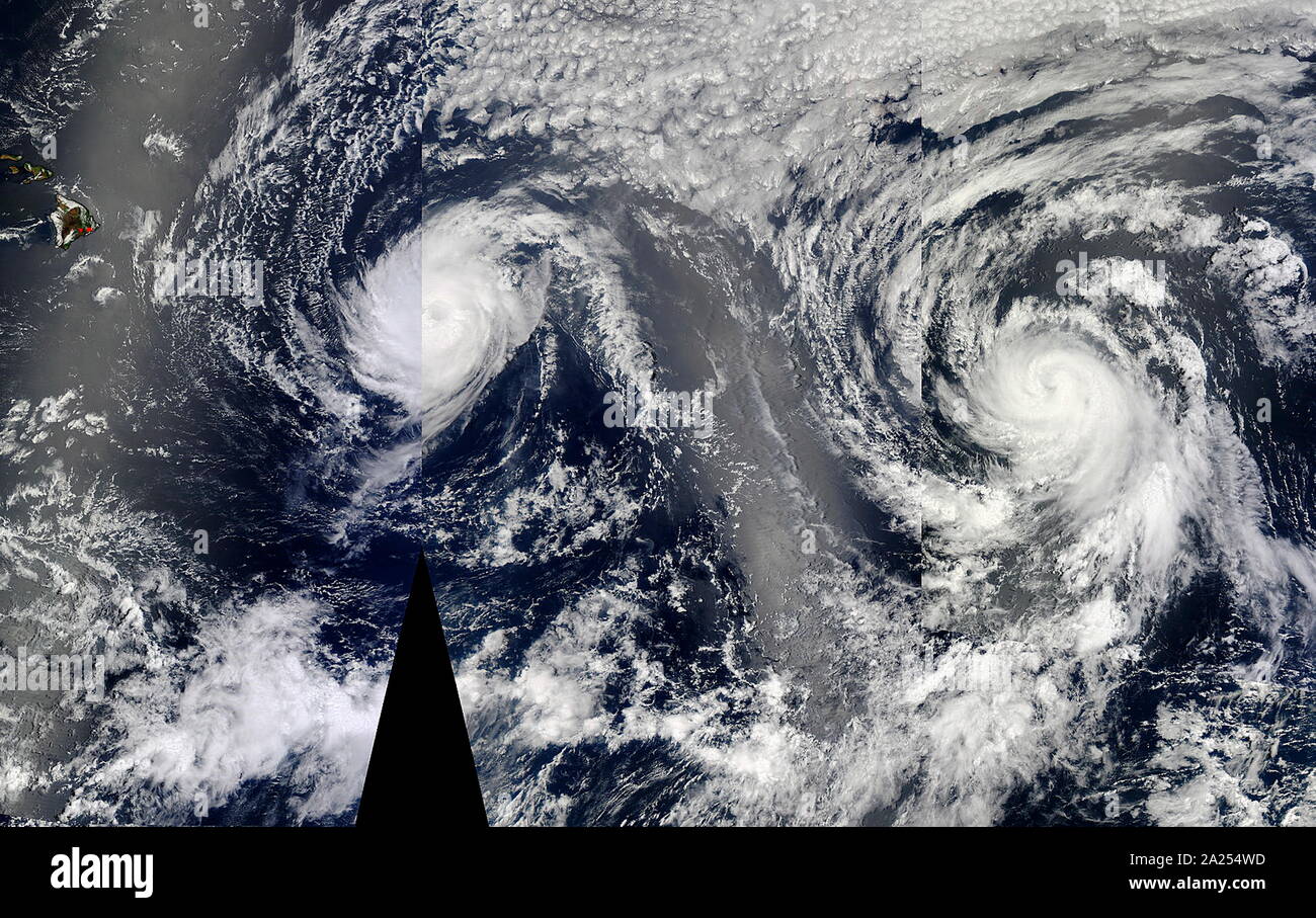 August 6 2014 at 22:30 UTC (6:30 p.m. EDT) NASA's Aqua satellite passed over Hurricanes Iselle and Julio approaching Hawaii. This image was created using three satellite passes Stock Photo
