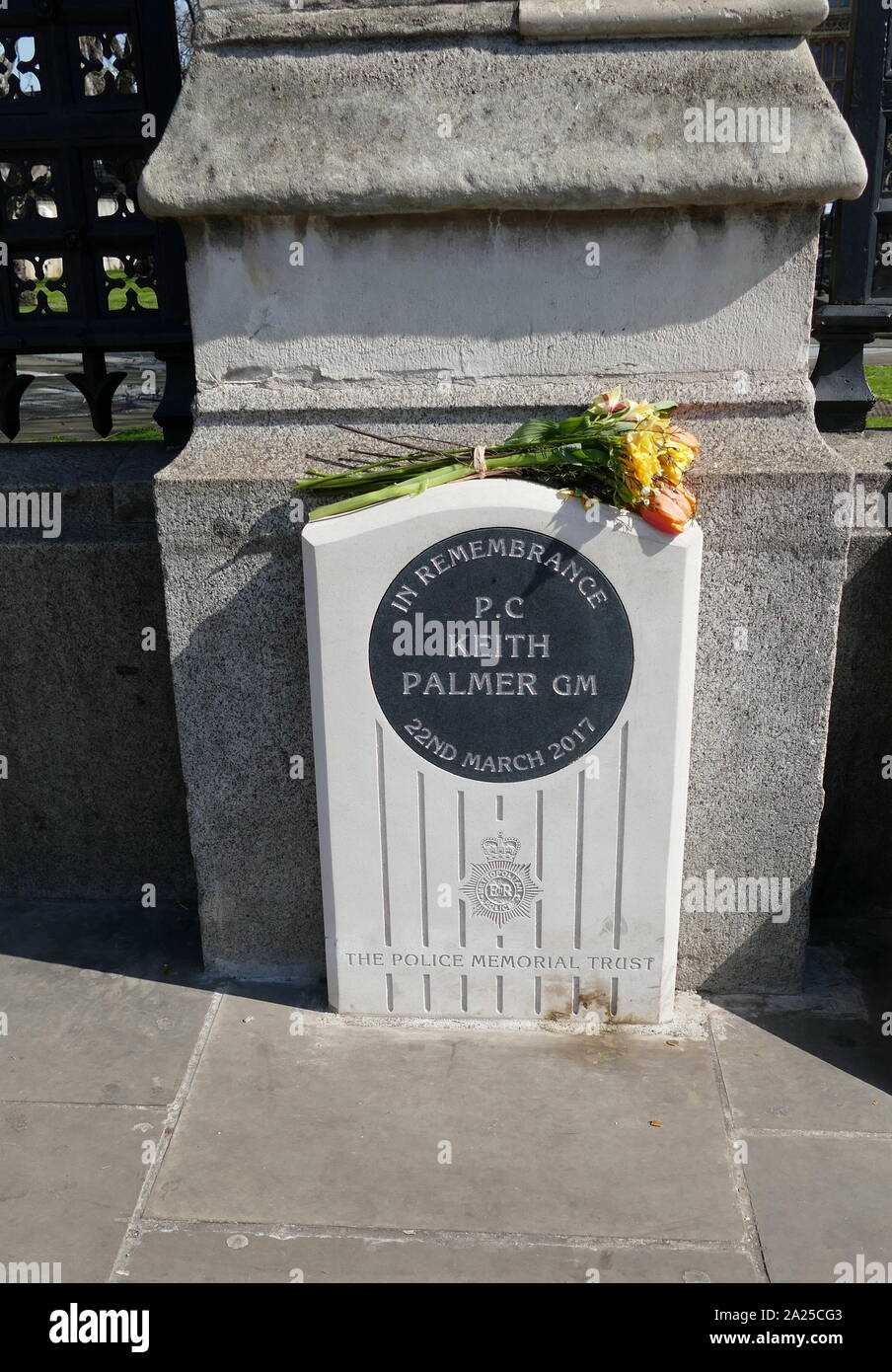 Memorial at the gates of Parliament dedicated to Keith Palmer, (1968 – 22 March 2017); British police officer who was posthumously awarded the George Medal, the second highest award for gallantry 'not in the face of the enemy'. Though unarmed, he stopped a knife-wielding terrorist from entering the Palace of Westminster during the 2017 Westminster attack; he died from wounds he received in this attack Stock Photo