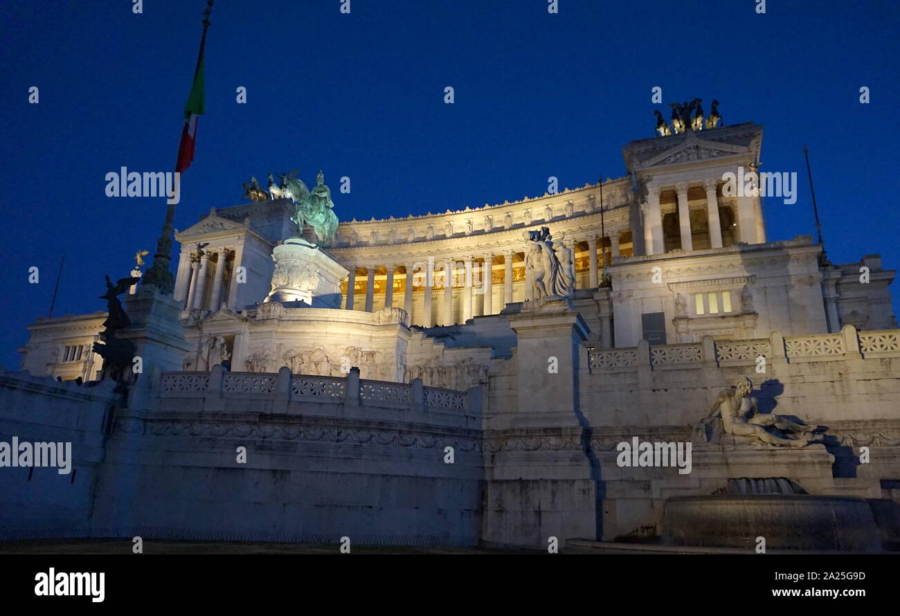 View of the Vittorio Emanuele II Monument at night. The Vittorio Emanuele II Monument, also known as the Vittoriano, Il Vittoriano, or Altare della Patria, is a monument built in honour of Victor Emmanuel II, the first king of a unified Italy, located in Rome, Italy. Stock Photo