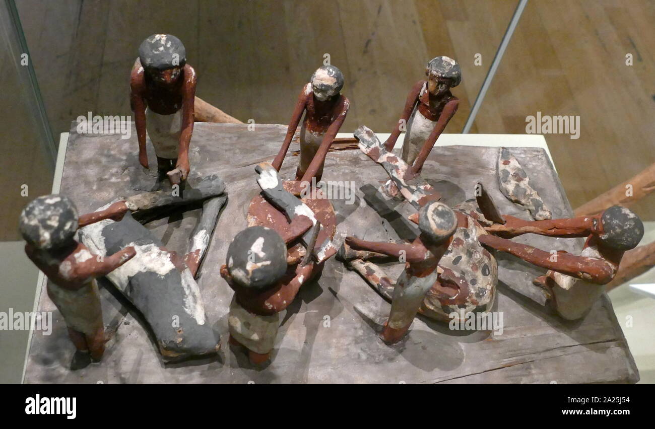Tomb treasure, wooden model showing farm labourers about 1550-1069 BC, New Kingdom period. Stock Photo