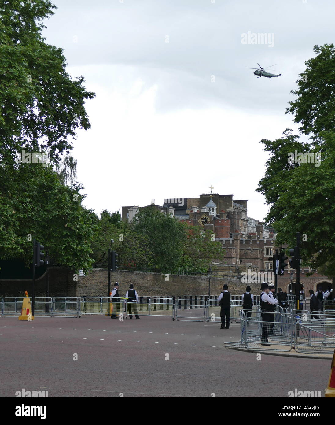 Marine One Helicopter carrying President Trump fly's over on the Mall en route to Buckingham Palace, London, secured by police during the state Visit for President Donald Trump June 2019 Stock Photo