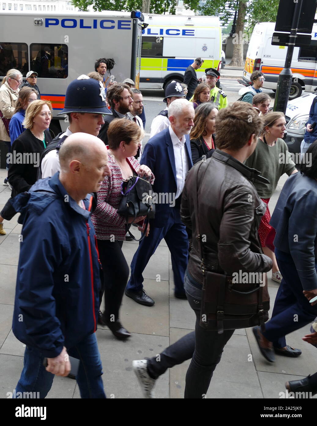 Labour Party Leader Jeremy Corbyn leaving a demonstration in Whitehall and Trafalgar Square London during the State Visit of US President Donald Trump to Great Britain; June 2019 Stock Photo