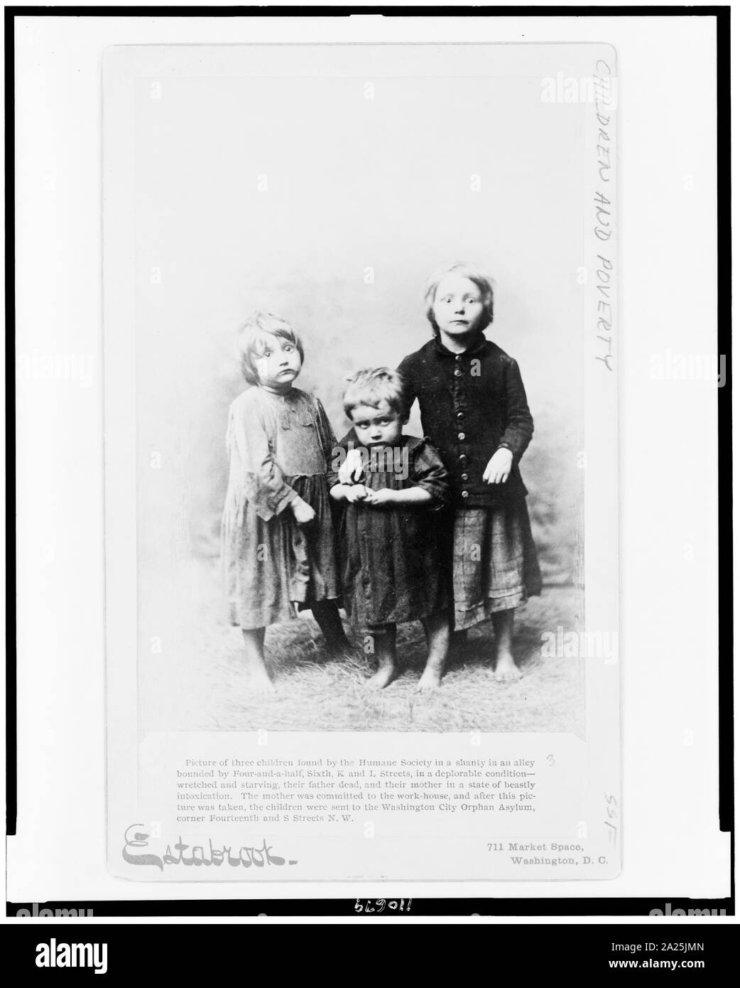 Picture of three children found by the Humane Society in a shanty in an alley bounded by Four-and-a-half, Sixth, K and L Streets, in a deplorable condition--wretched and starving, their father dead, and their mother in a state of beastly intoxication / Estabrook, Washington, D.C. Stock Photo