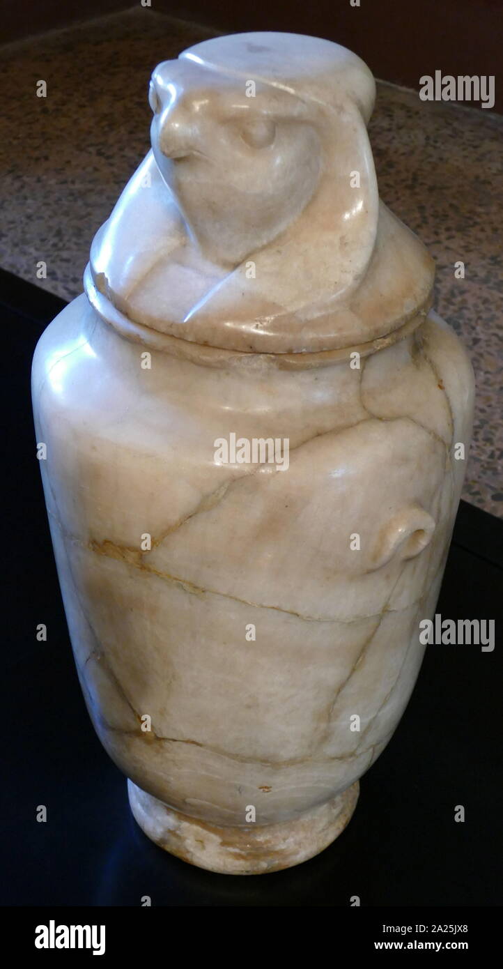 Canopic jar made from alabaster, 1st century BC, Egyptian. Depicts Horus Stock Photo