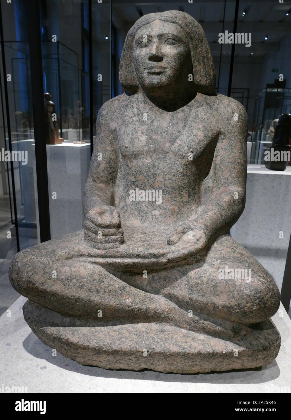 Seated granite stone statue, of the granary scribe, der-senedj. 2400 BC, Giza, Egypt; Stock Photo