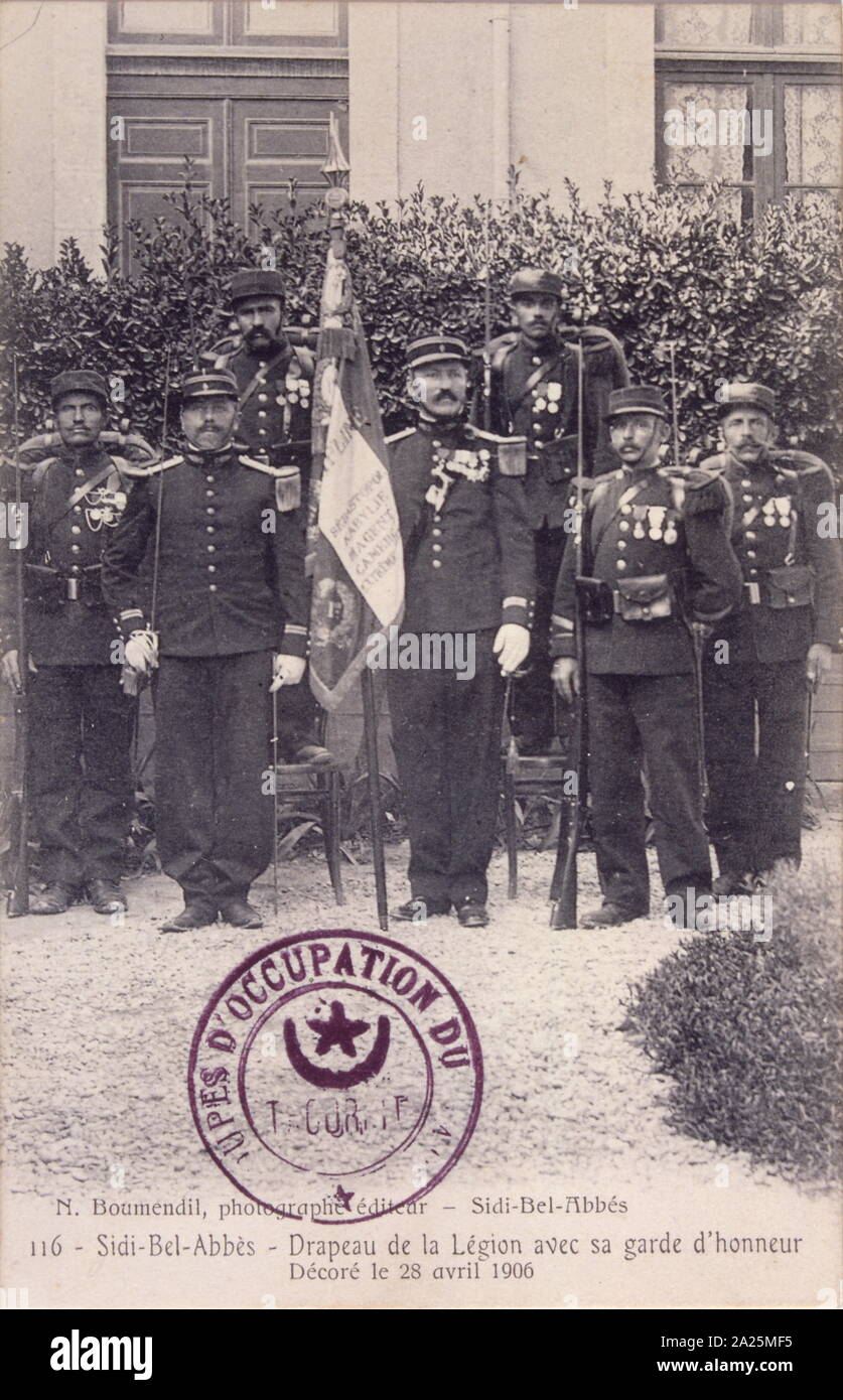 French legionnaire colonial soldiers on flag duty in Sidi Bel Abbès, Algeria. postcard 1909 Stock Photo