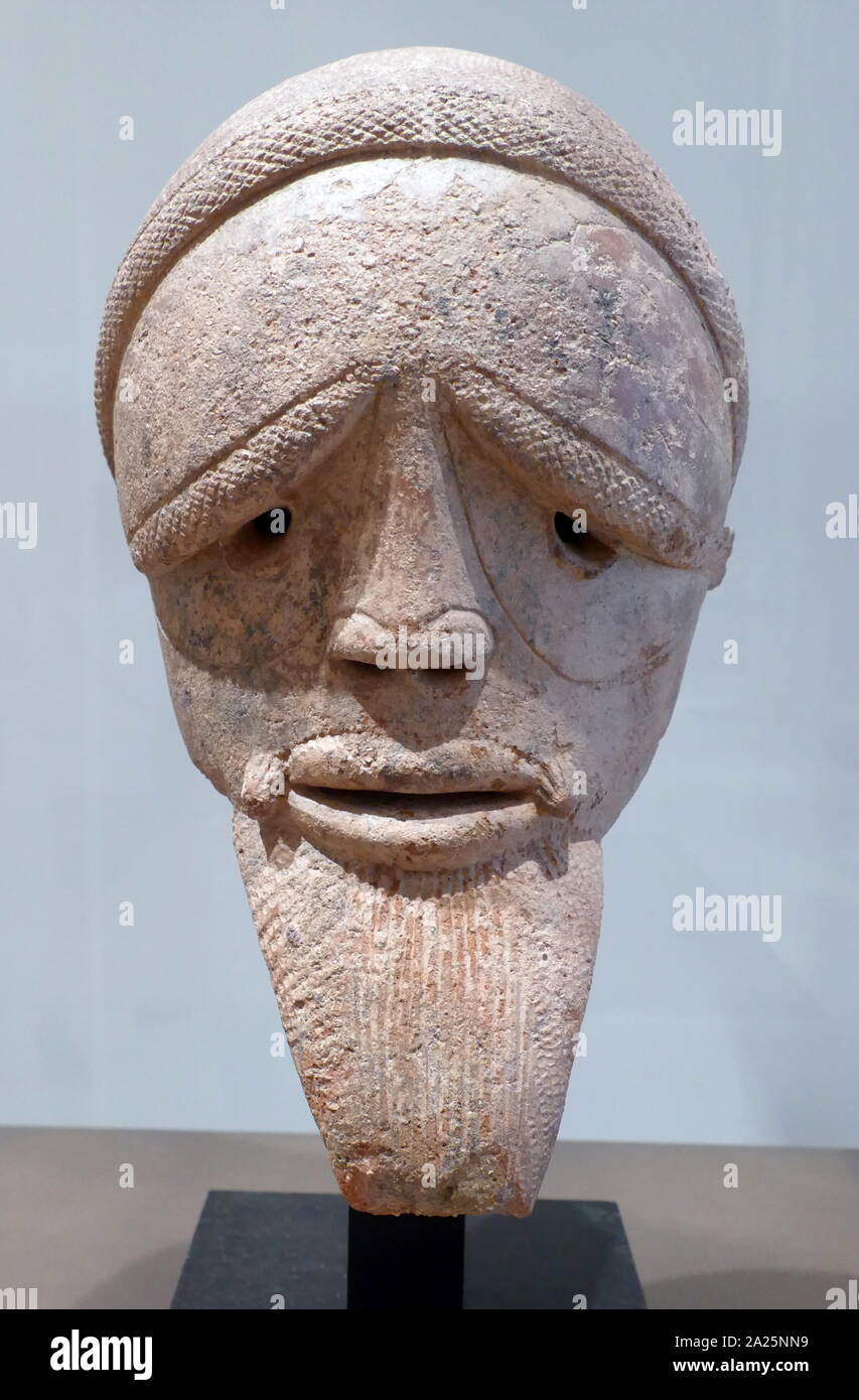 Terracotta mask from nigeria Stock Photo