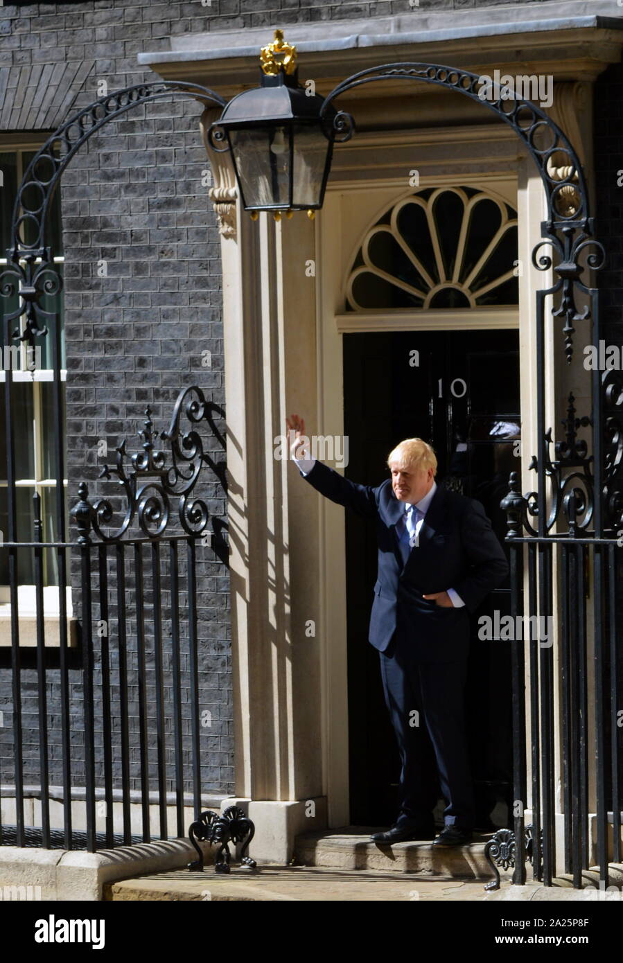 Boris johnson; (born 19 june 1964), british politician & prime minister of the united kingdom and leader of the conservative party since july 2019. boris johnson arriving in downing street on his first day as prime minister 24th july 2019 Stock Photo