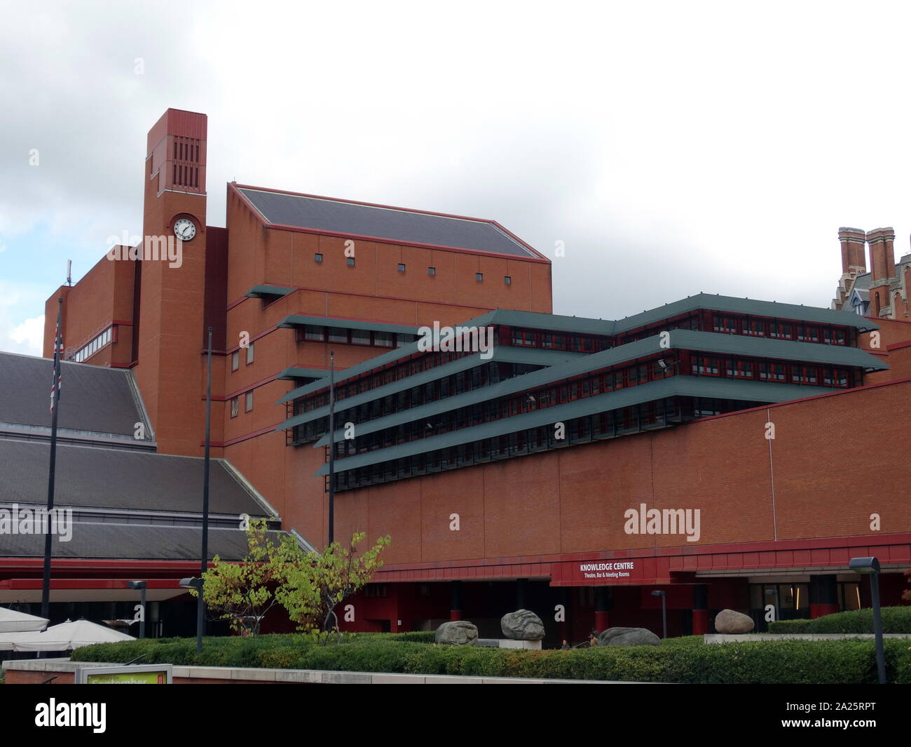 The British Library is the national library of the United Kingdom. It is estimated to contain 170-200 million items. The Library is now located in a purpose-built building on the north side of Euston Road in St Pancras, London. Following the closure of the Round Reading Room on 25 October 1997 the library stock began to be moved into the St Pancras building. The new library was designed specially for the purpose by the architect Colin St John Wilson Stock Photo
