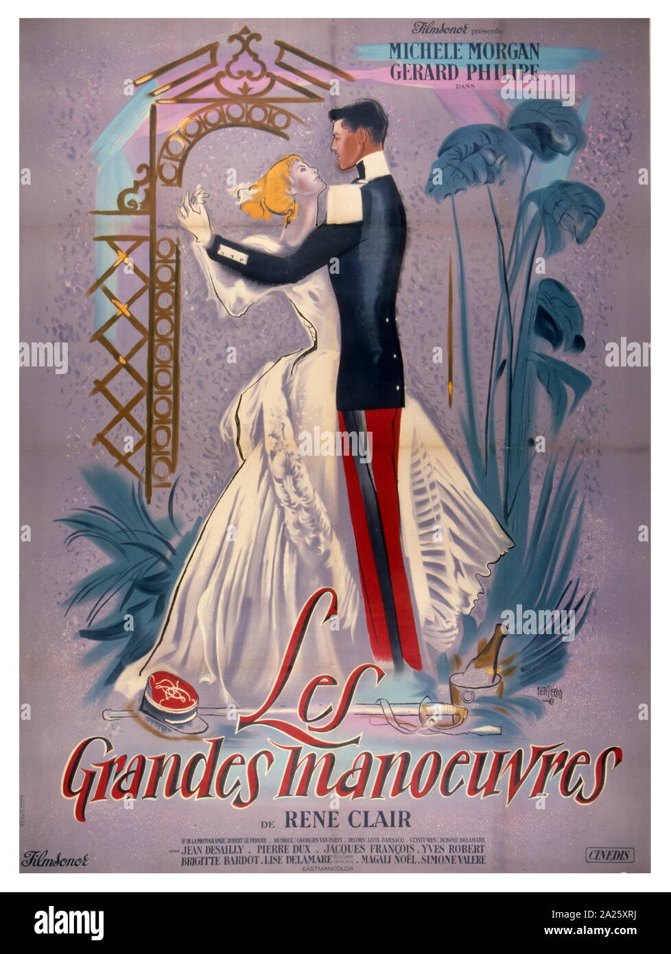 French Film Poster for 'The Grand Manoeuvre' (Les Grandes Manoeuvres), a 1955 French drama film written and directed by Rene Clair, and starring Michele Morgan and Gerard Philipe. The Grand Manoeuvre. It is a romantic comedy-drama set in a French provincial town just before World War I, and it was Rene Clair's first film to be made in colour. Stock Photo