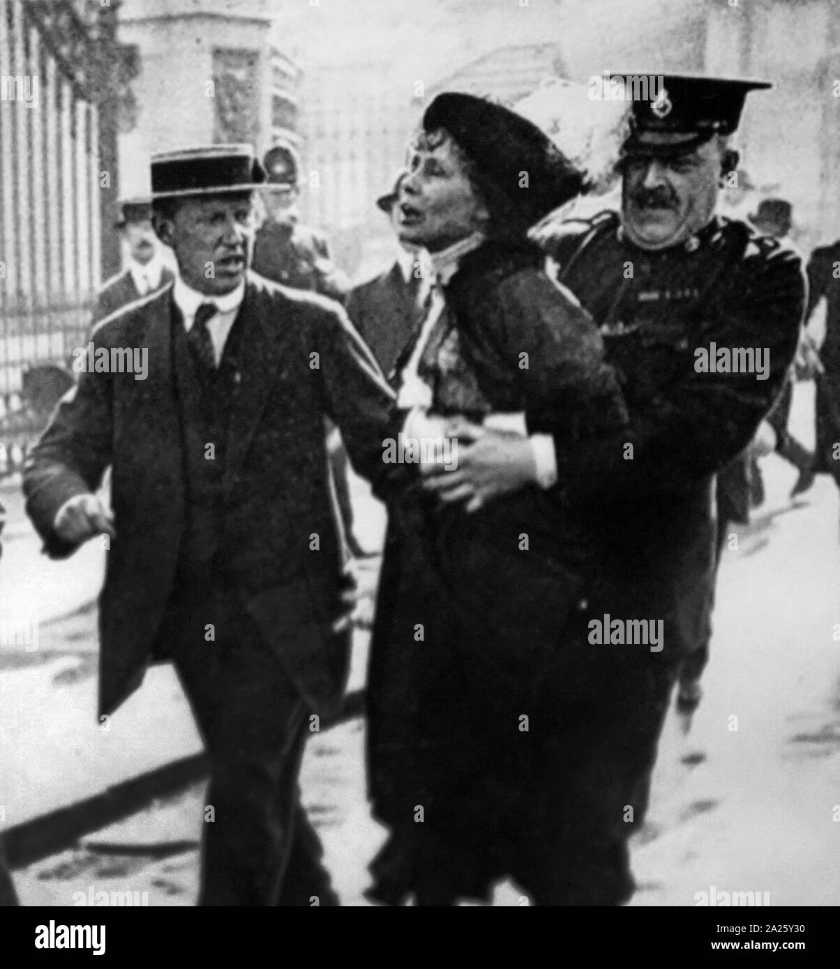 Photograph of Emmeline Pankhurst being arrested in Britain. Emmeline Pankhurst (1858-1928) a British political activist and helper of the British suffragette movement who helped women win the right to vote. Stock Photo