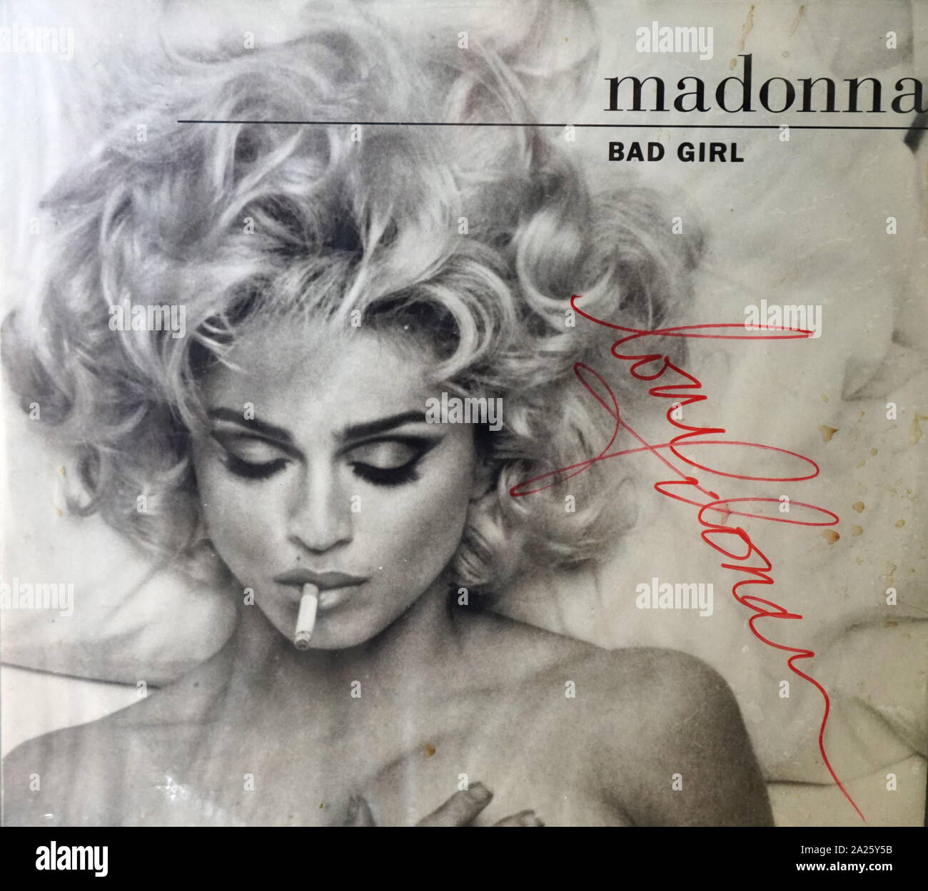 Autographed cover of Madonna's 'Bad Girl' single. Madonna Louise Ciccone (1958-) an American singer-songwriter actress and businesswoman. Stock Photo