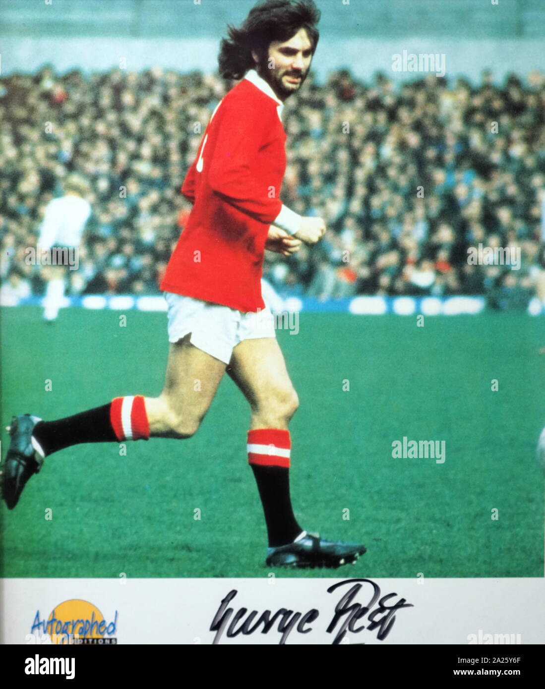 An autographed photograph of George Best. George Best (1946-2005) a Northern Irish professional footballer who spent most of his career at Manchester United. Stock Photo