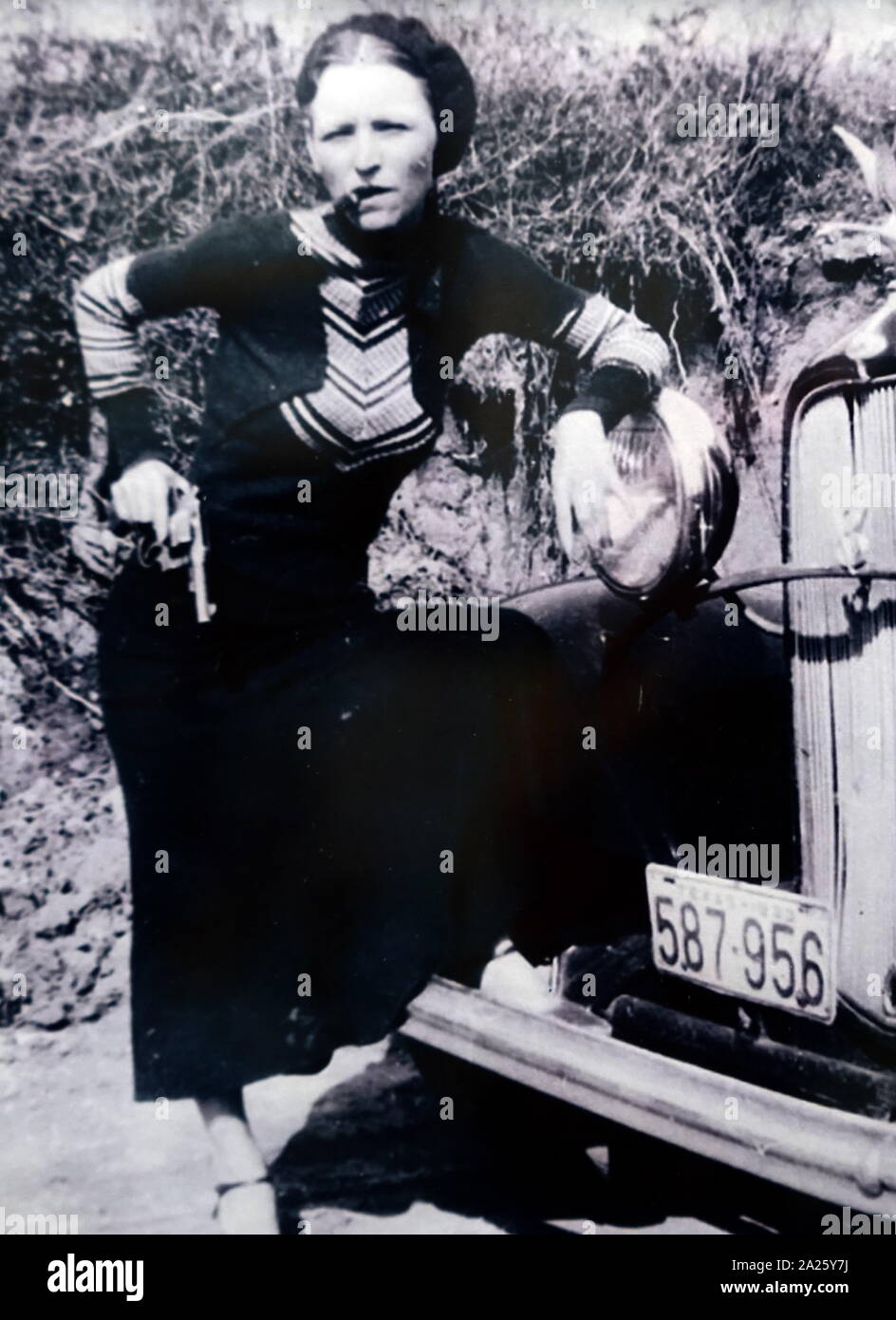 A photograph of Bonnie Parker. Bonnie Elizabeth Parker (1910-1934) and Clyde Chestnut Barrow (1909-1934) American criminals who travelled around the Central United States with their gang during the Great Depression. Stock Photo