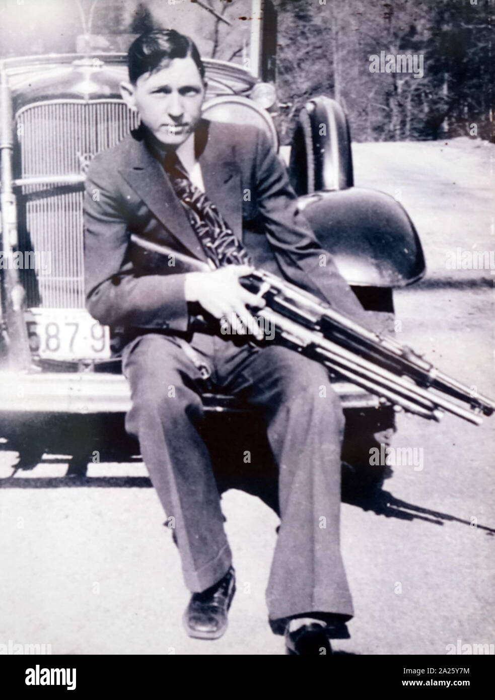 A photograph of Clyde Barrow. Clyde Chestnut Barrow (1909-1934) an American criminal who travelled around the Central United States with Bonnie Parker and their gang during the Great Depression. Stock Photo