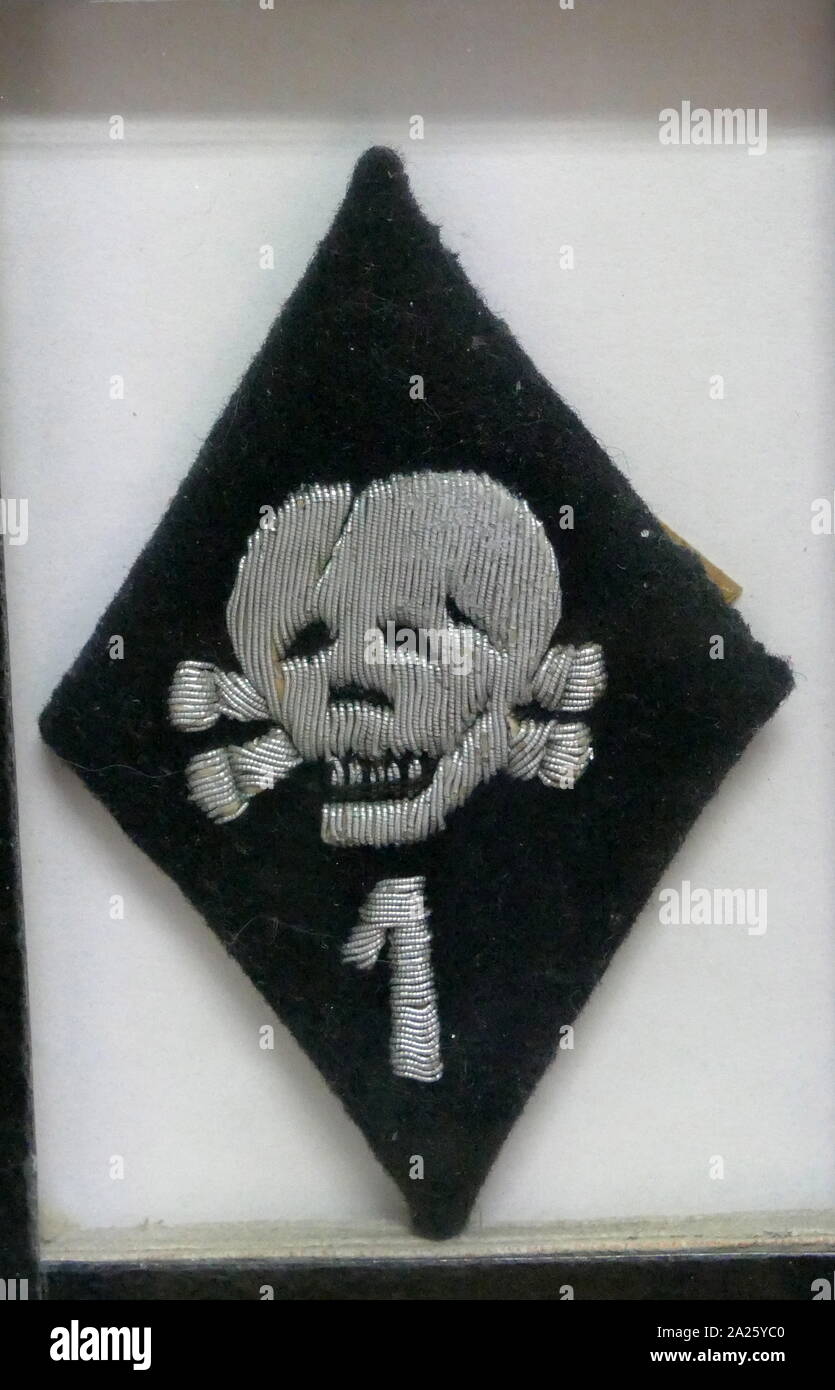 Badge worn by members of the SS-Totenkopfverbande. The SS-Totenkopfverbande, literally translated as Death's Head Units, was the SS organization responsible for administering the Nazi concentration camps and extermination camps for Nazi Germany, among similar duties Stock Photo