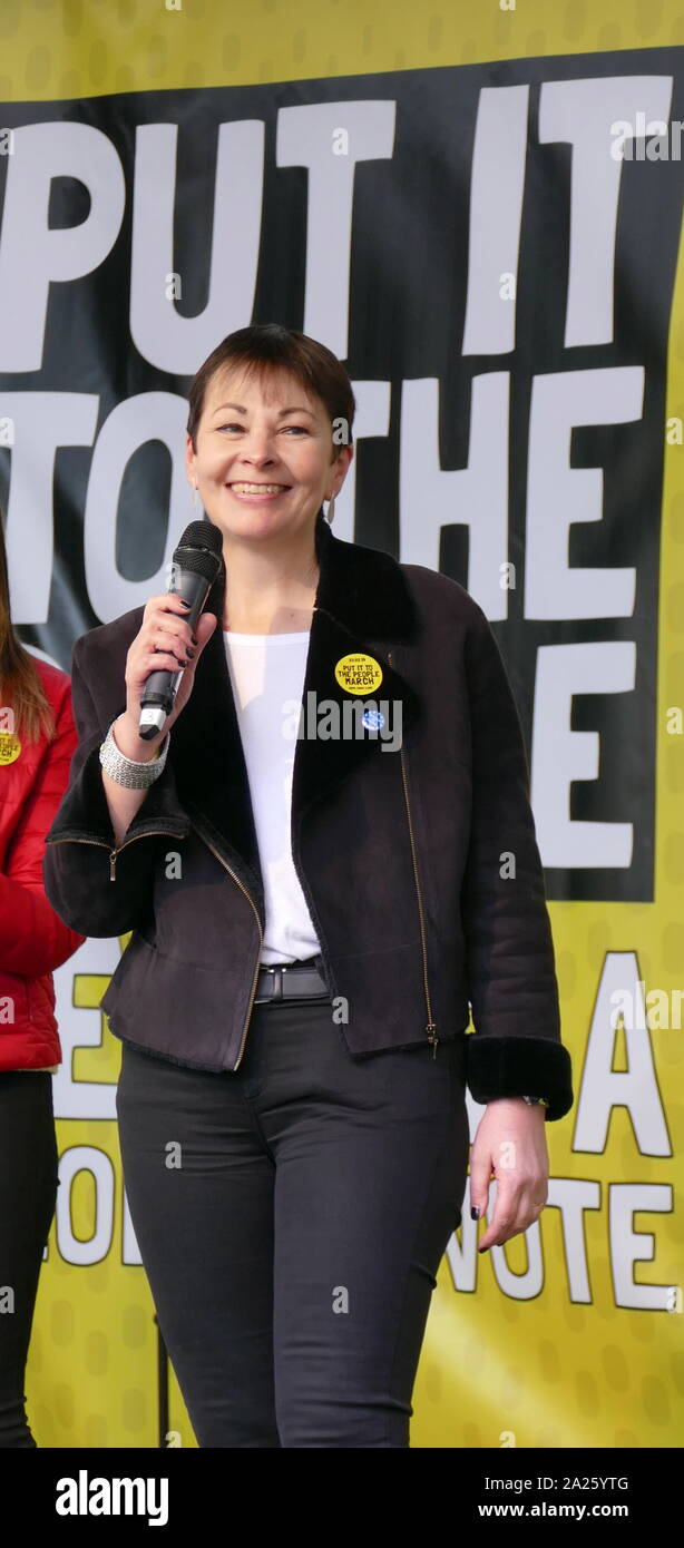 Caroline Lucas; British; Green Party; politician; Member of Parliament (MP) for Brighton Pavilion, addresses the 'People's Vote' march in Parliament Square, London. The People's Vote march took place in London on 23 March 2019 as part of a series of demonstrations to protest against Brexit, call for a new referendum, and ask the British Government to revoke Article 50. It brought to the capital hundreds of thousands of protestors, or over a million people according to the organizers. Stock Photo