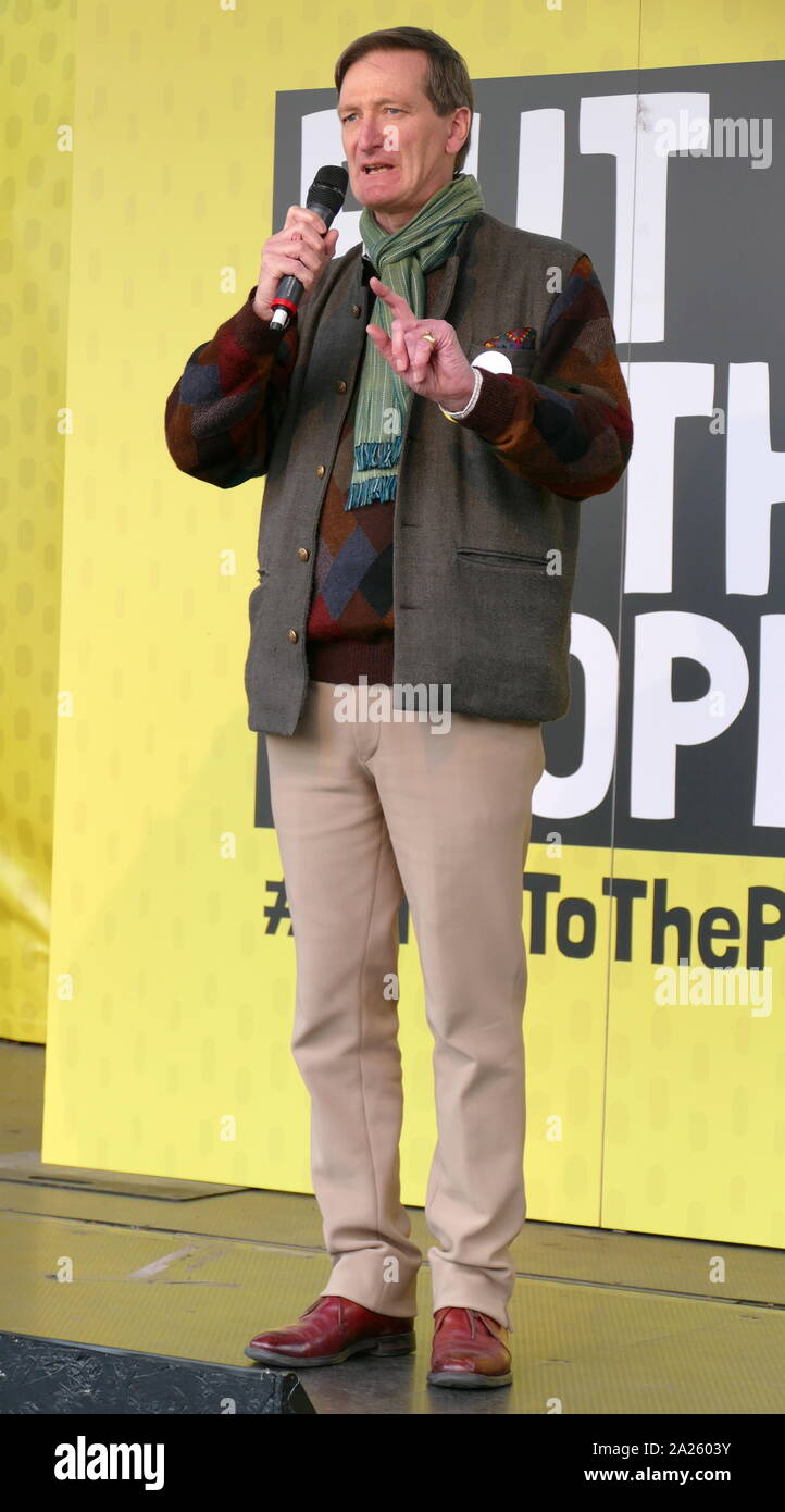 Dominic Grieve, British Conservative politician, addresses the 'People's Vote' march in Parliament Square, London. The People's Vote march took place in London on 23 March 2019 as part of a series of demonstrations to protest against Brexit, call for a new referendum, and ask the British Government to revoke Article 50. It brought to the capital hundreds of thousands of protestors, or over a million people according to the organizers. Stock Photo