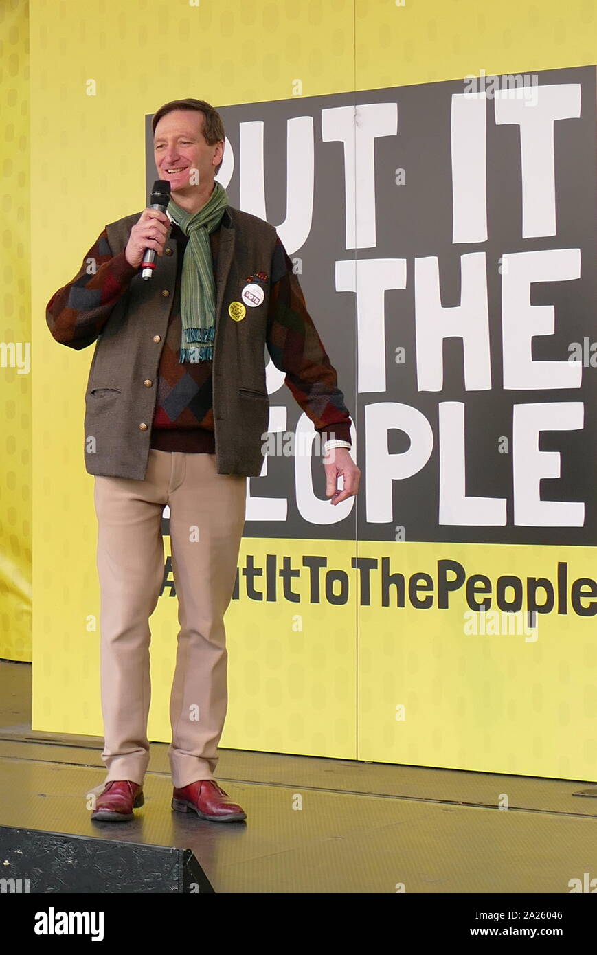 Dominic Grieve, British Conservative politician, addresses the 'People's Vote' march in Parliament Square, London. The People's Vote march took place in London on 23 March 2019 as part of a series of demonstrations to protest against Brexit, call for a new referendum, and ask the British Government to revoke Article 50. It brought to the capital hundreds of thousands of protestors, or over a million people according to the organizers. Stock Photo