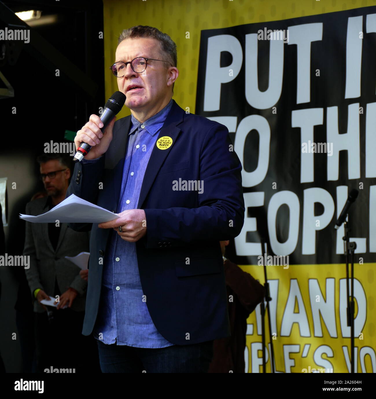 Tom Watson, Deputy Leader of the Labour Party and Member of Parliament for West Bromwich, addresses the 'People's Vote' march in Parliament Square, London. The People's Vote march took place in London on 23 March 2019 as part of a series of demonstrations to protest against Brexit, call for a new referendum, and ask the British Government to revoke Article 50. It brought to the capital hundreds of thousands of protestors, or over a million people according to the organizers. Stock Photo