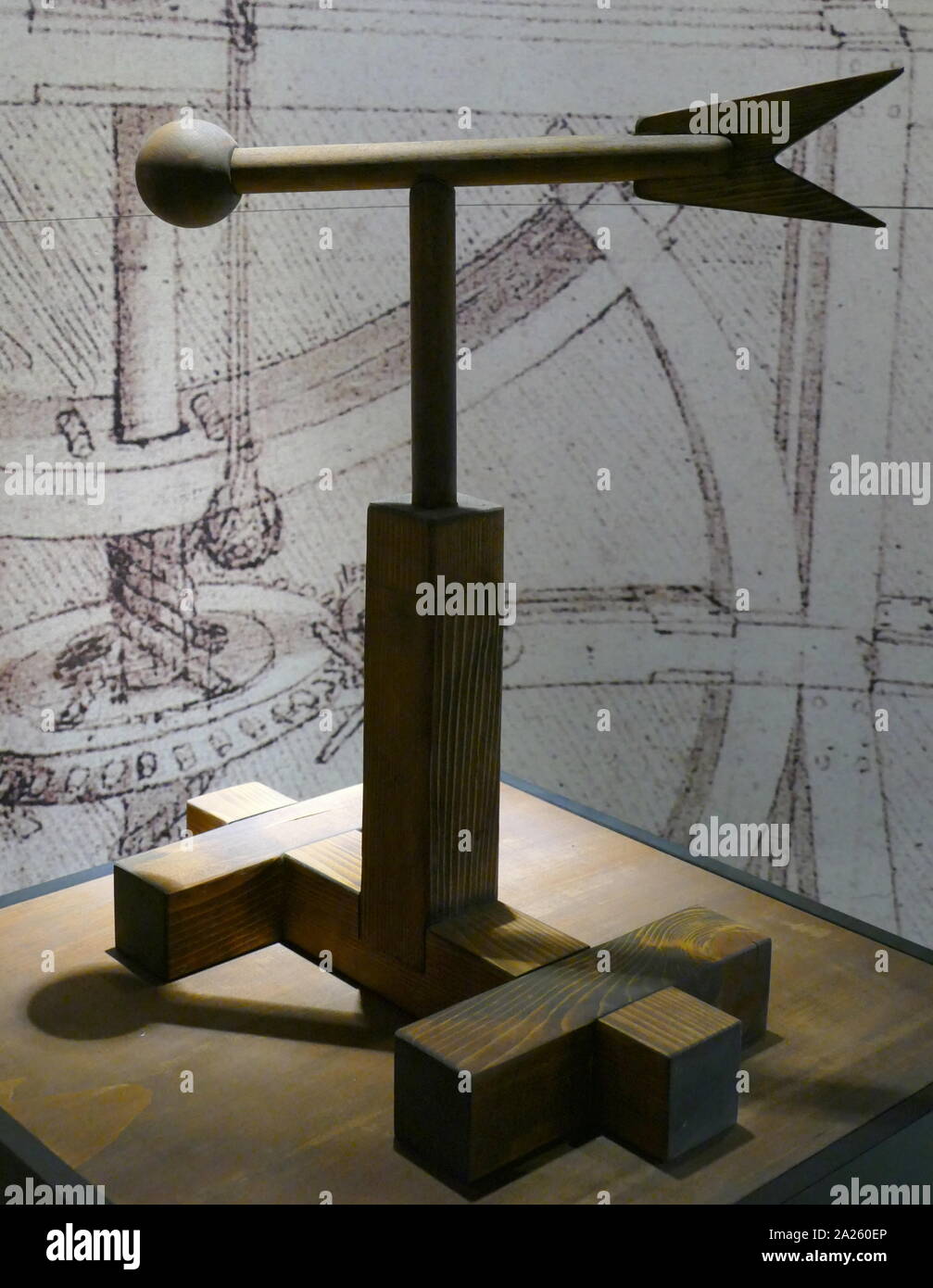 Model of an Anemoscope, used to identify wind direction; based on a drawing by Leonardo da Vinci (1452-1519), Italian artist and polymath; Codex Arundel folio 241 r. It consists of a wooden frame holding a vane rotating on a pin, with a round head at one end and a two-pronged tail at the other. As the vane turns, it shows the exact direction of the wind. Stock Photo