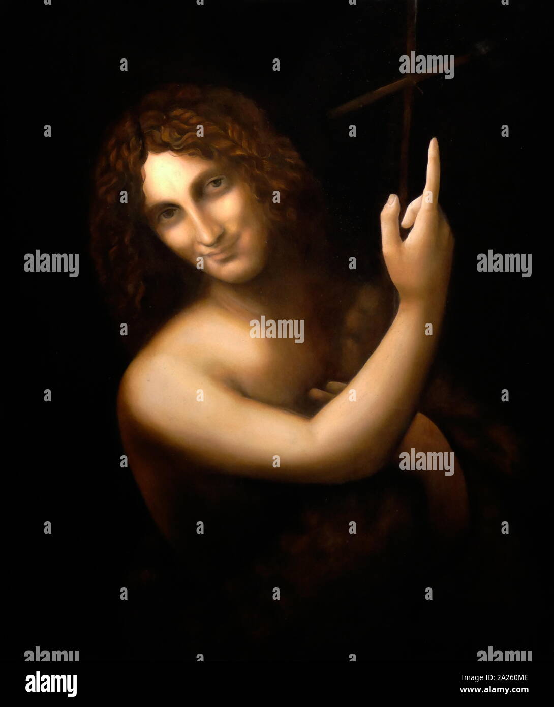 &#13;&#10;Saint John the Baptist painted by Leonardo da Vinci (April 1452 - May 1519), an Italian polymath of the Renaissance Stock Photo