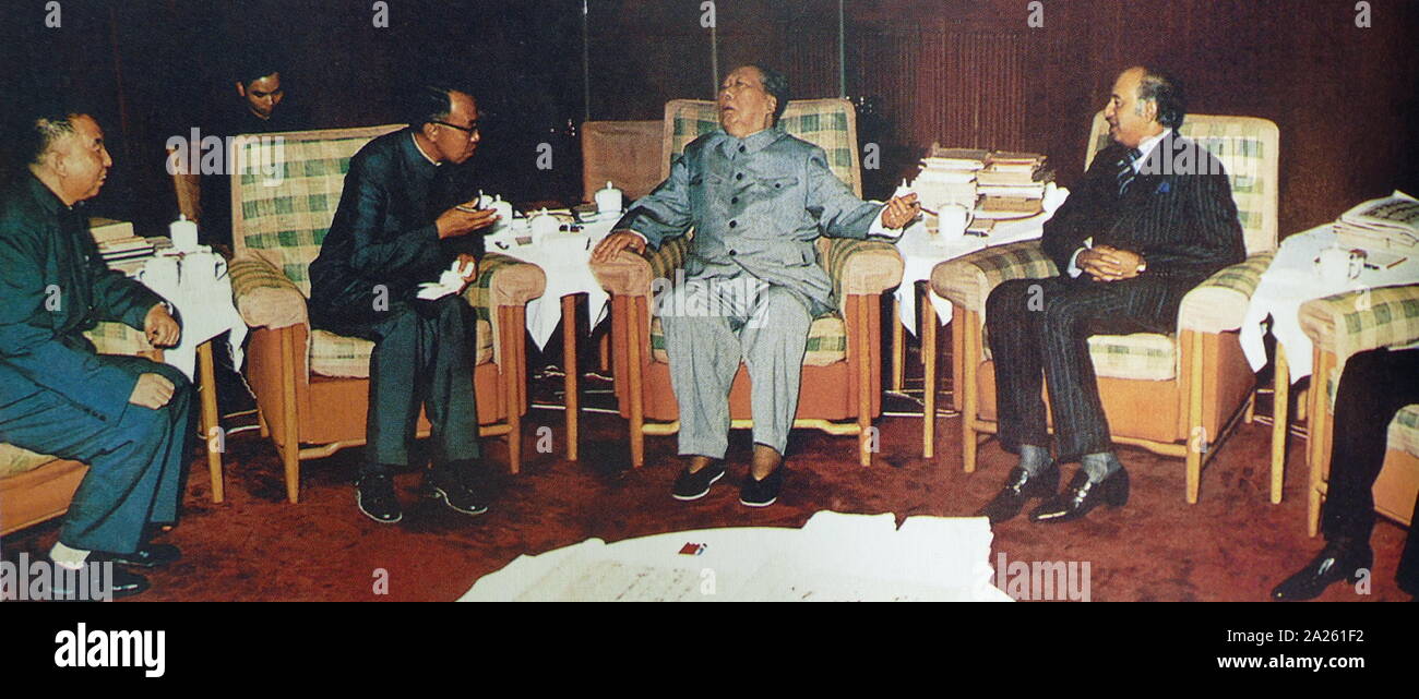 Hua Guofeng (left) with Mao Zedong, May 27, 1976, when he met the visiting Pakistani Prime Minister Zulfikar Ali Bhutto. It was at this meeting that Mao agreed to transfer 50 kg of uranium to Pakistan, thereby jump starting its nuclear programme and allowing Pakistan to later develop its first nuclear weapons in the 1980s. Mao Zedong (1893 - September 9, 1976), was a Chinese communist revolutionary who became the founding father of the People's Republic of China (PRC), which he ruled as the Chairman of the Communist Party of China from its establishment in 1949 until his death Stock Photo