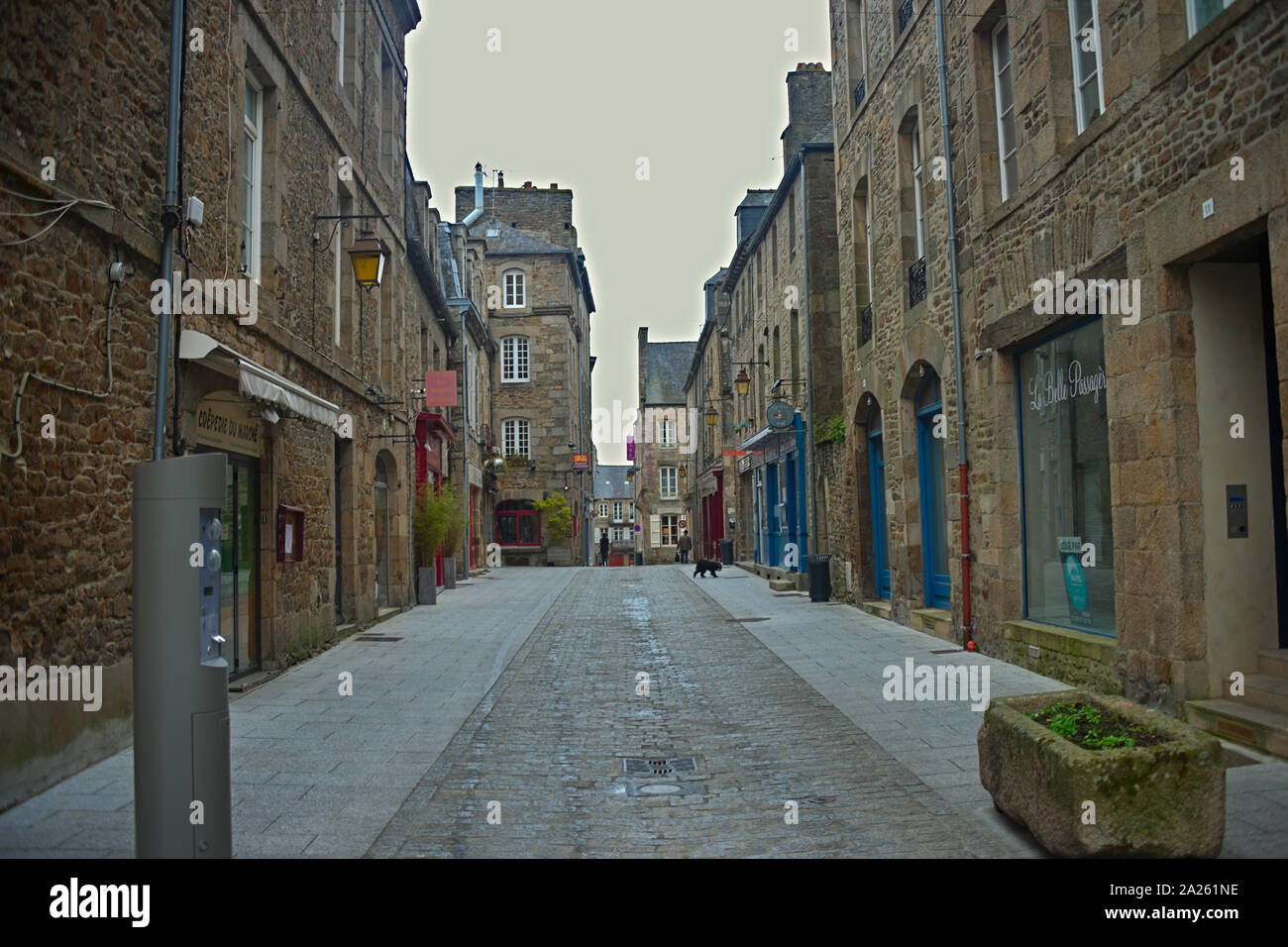 DINAN, FRANCE - April 7th 2019 - Empty street with stone building in traditional town Stock Photo