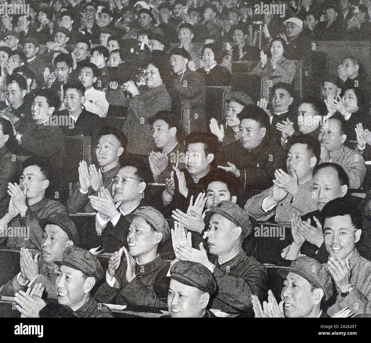 delegates to the Chinese Peoples Congress, applauding a speech. 1967 Stock Photo