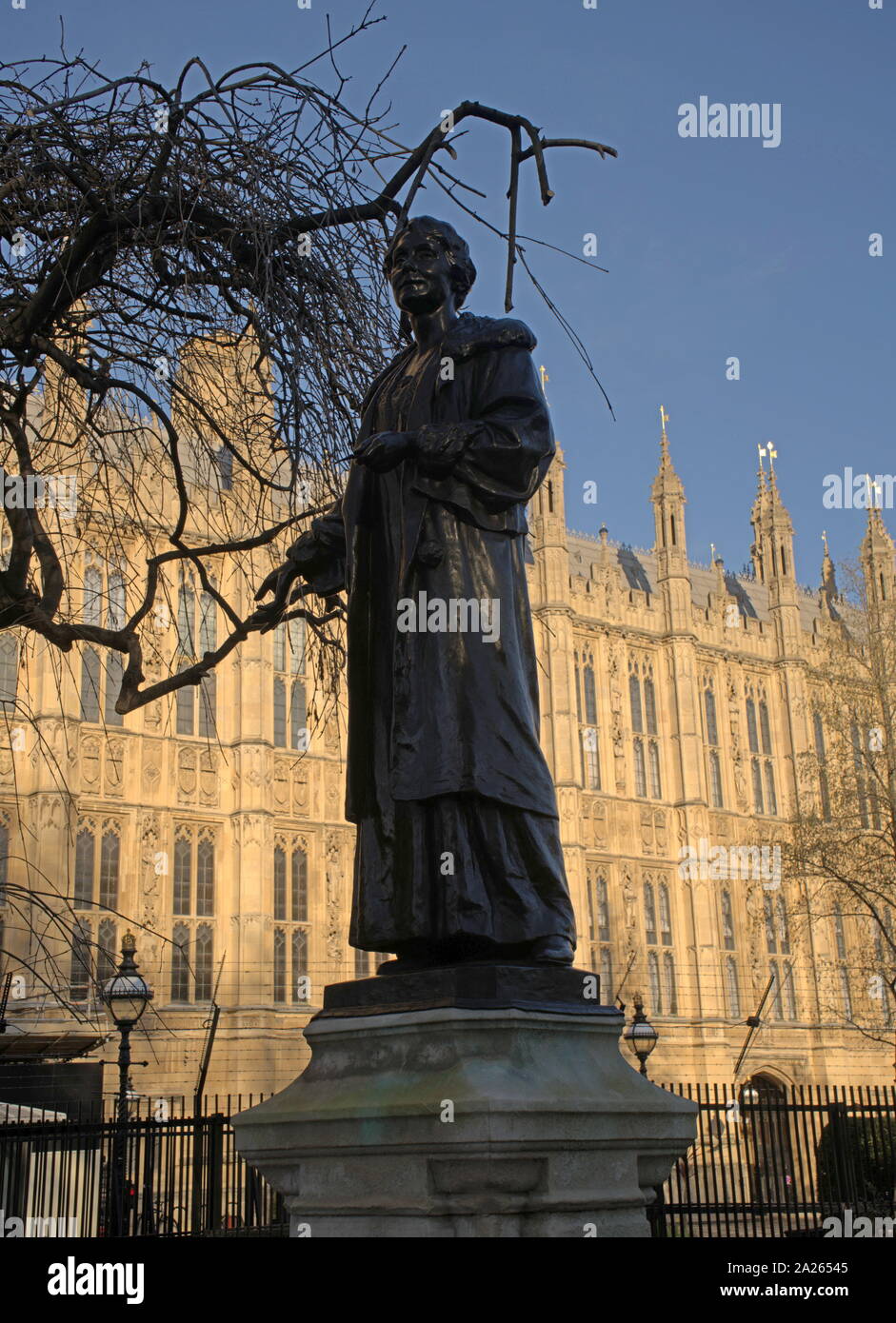 The Emmeline and Christabel Pankhurst Memorial, is a memorial to Emmeline Pankhurst a British suffragette, and her daughter Christabel. It stands at the entrance to Victoria Tower Gardens, south of Victoria Tower at the southwest corner of the Palace of Westminster. bronze statue of Emmeline Pankhurst by Arthur George Walker, unveiled in 1930. In 1958 the statue was relocated to its current site and the bronze reliefs commemorating Christabel Pankhurst were added. Stock Photo