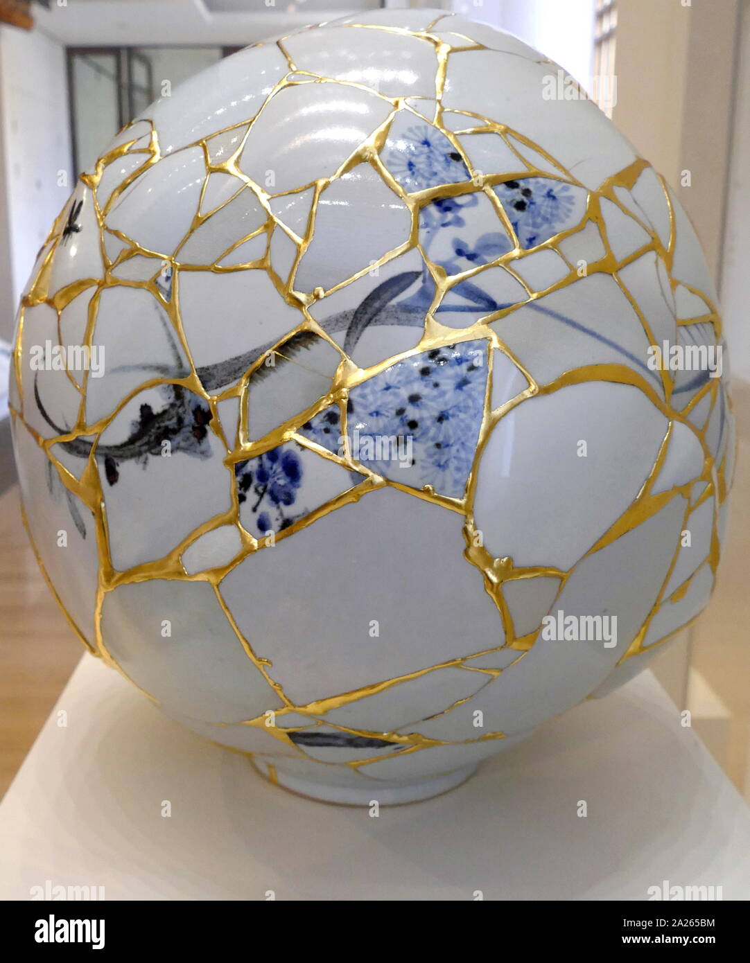 Translated Vase by Yeesookyung (b. 1963), Republic of South Korea, 2014. made from porcelain fragments, epoxy, lacquer, and gold leaf. The “Translated Vase” series was first exhibited in 2001. The artist translates (recycles), rejected objects to make new, whole works. Stock Photo