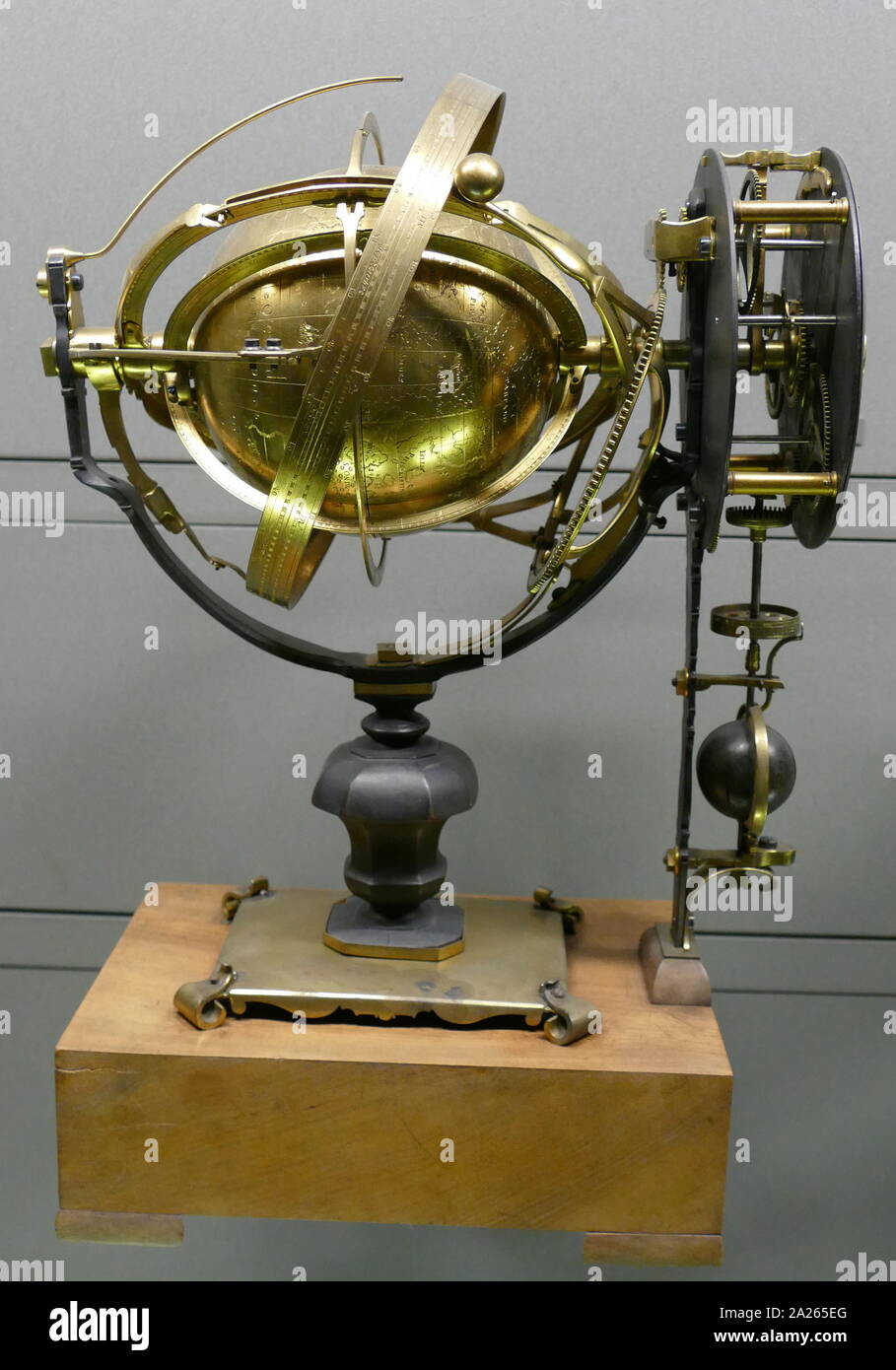 French armillary sphere, 18th century, brass. An armillary sphere (variations are known as spherical astrolabe, armillary, or armil) is a model of objects in the sky (on the celestial sphere), consisting of a spherical framework of rings, centred on Earth or the Sun, that represent lines of celestial longitude and latitude and other astronomically important features, such as the ecliptic. As such, it differs from a celestial globe, which is a smooth sphere whose principal purpose is to map the constellations. Stock Photo
